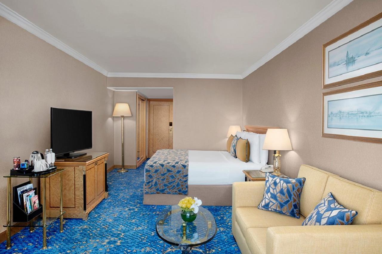 Habitación Clásica con cama extragrande y vistas a la ciudad