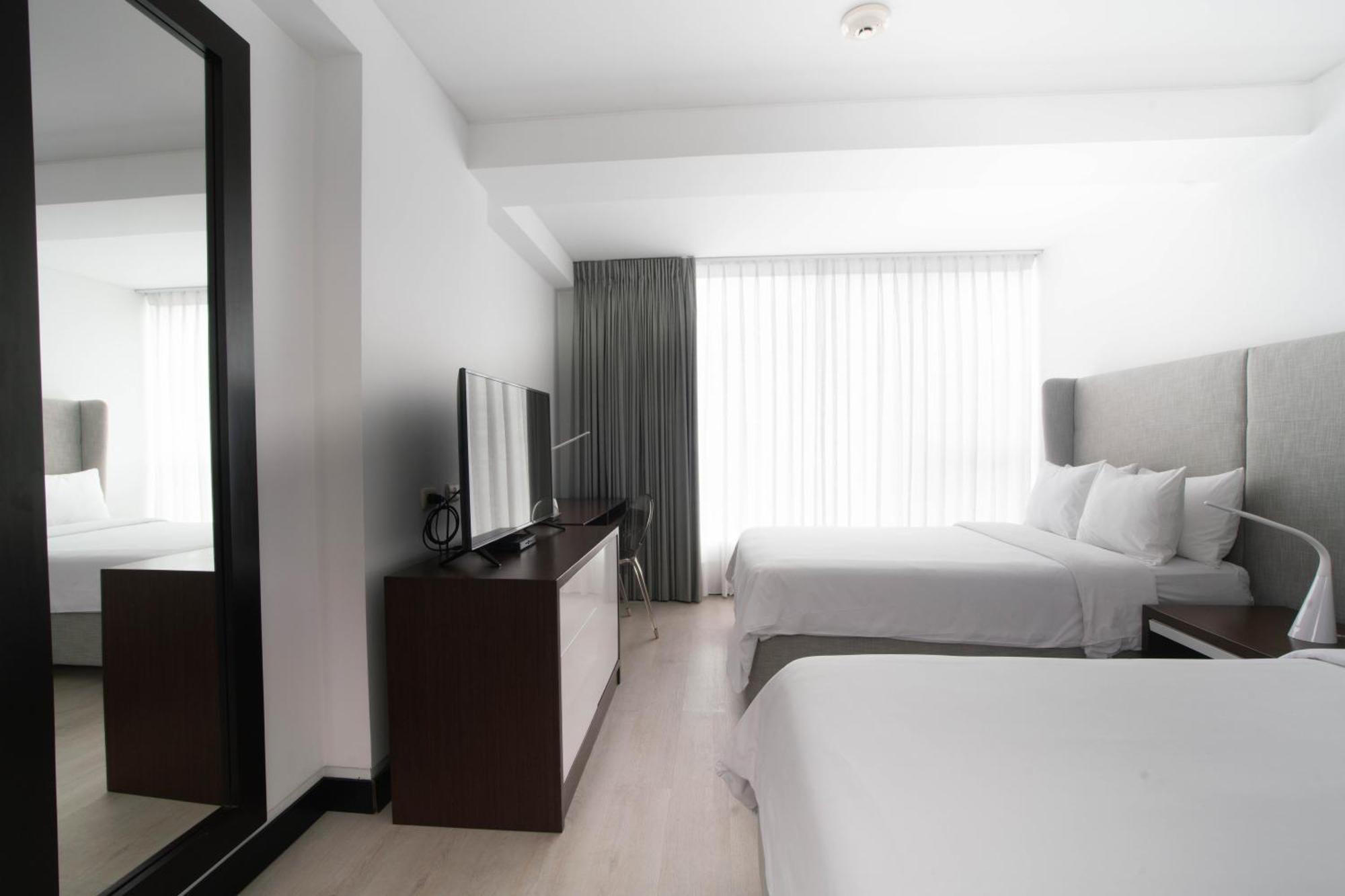 Habitación Doble Premium con 2 camas dobles