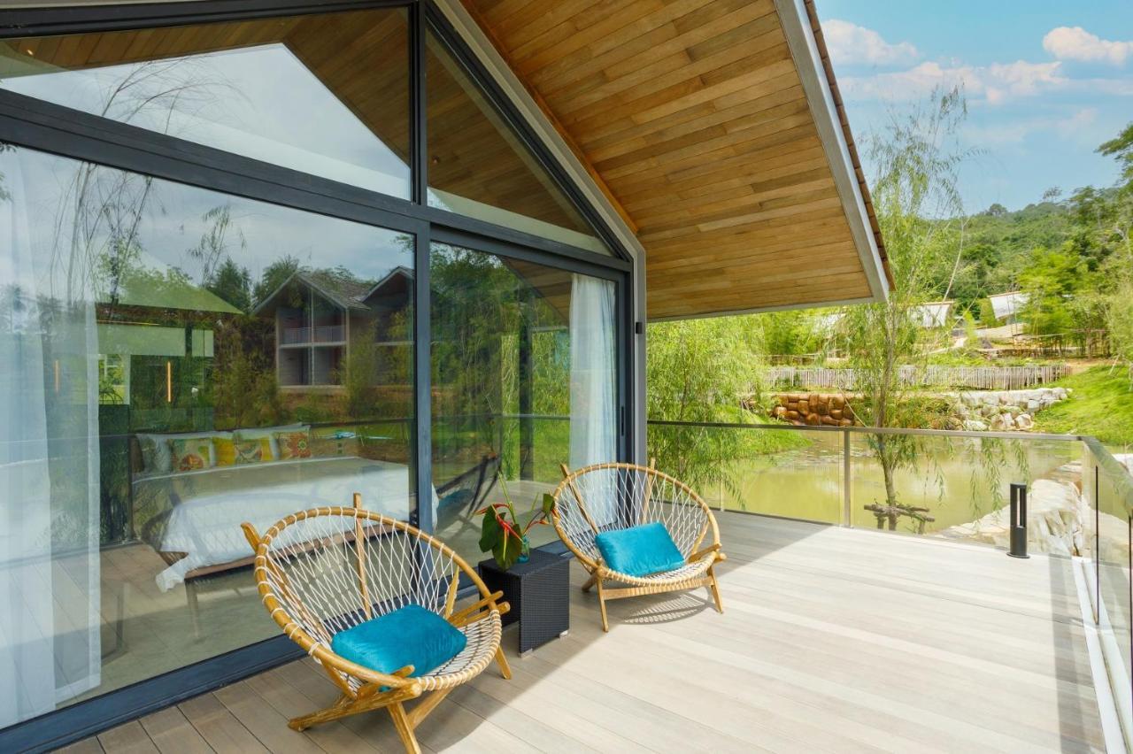 Villa de un dormitorio con vista a la laguna, balcón y traslado programado en barco