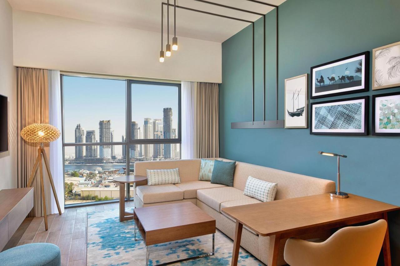 Apartamento de 1 dormitorio con 1 cama extragrande, sofá cama y vistas al arroyo (traslado gratuito al centro comercial Dubai Mall, al centro comercial Festival City Mall, a la playa J1 y a la estación de metro Al Jaddaf)