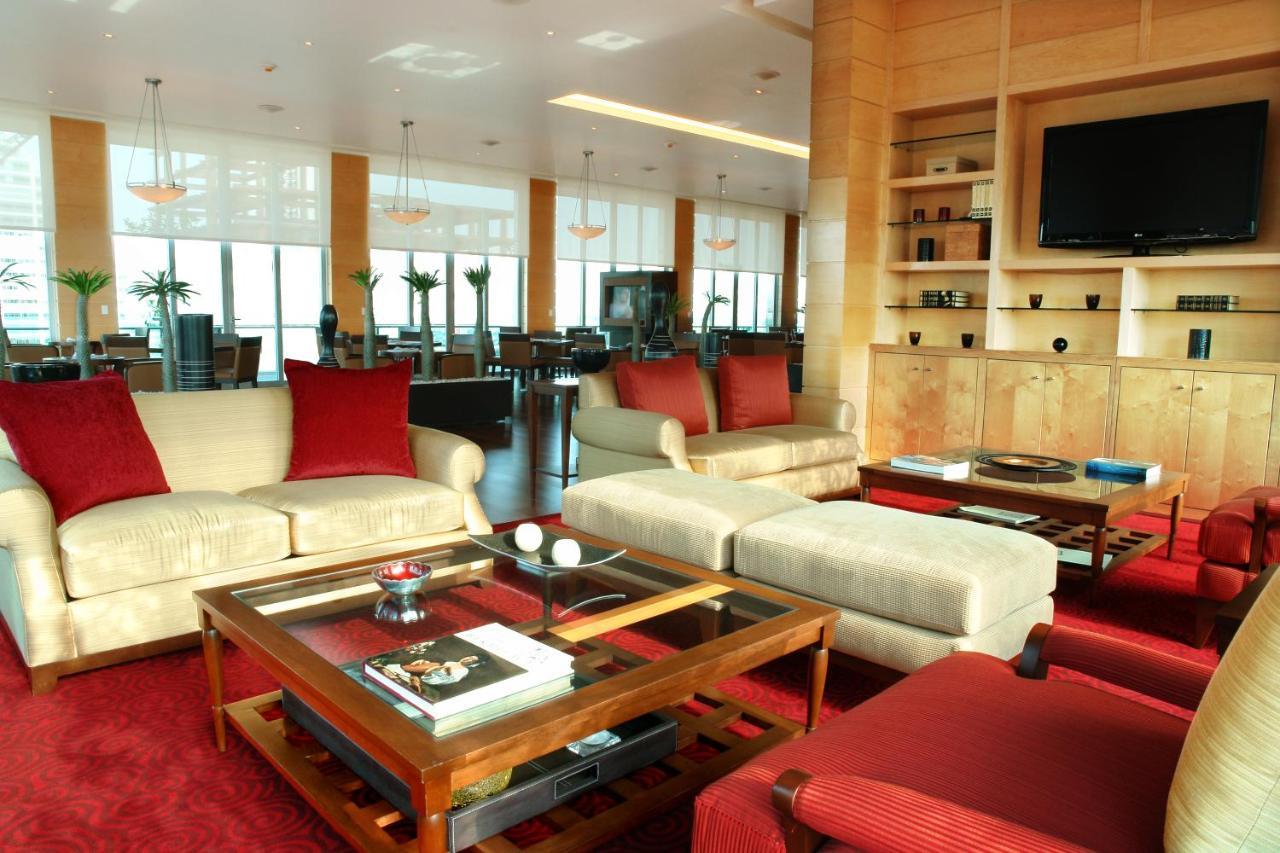 Habitación esquinera con acceso al salón executive - 1 cama extragrande