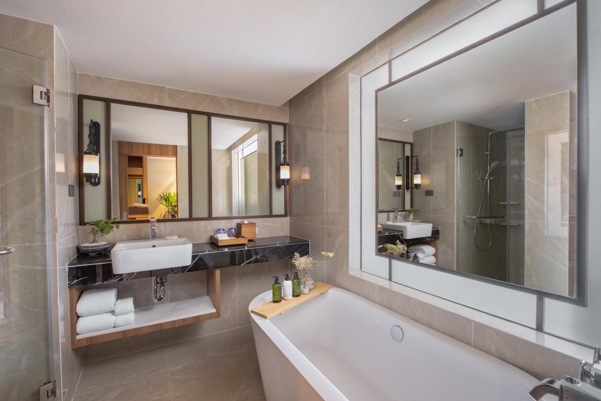 Habitación Premier comunicada con vistas a la piscina