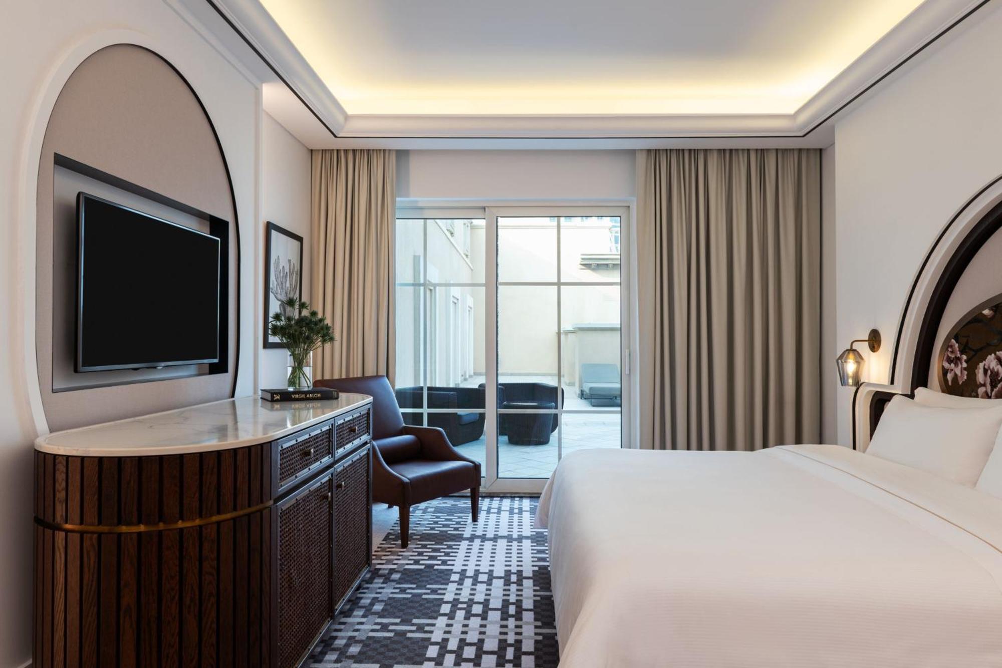 Suite Deluxe con vistas al mar, cama extragrande, balcón, sala de estar independiente con sofá cama, desayuno, transporte desde el aeropuerto de Dubái y acceso al parque acuático Jungle Bay