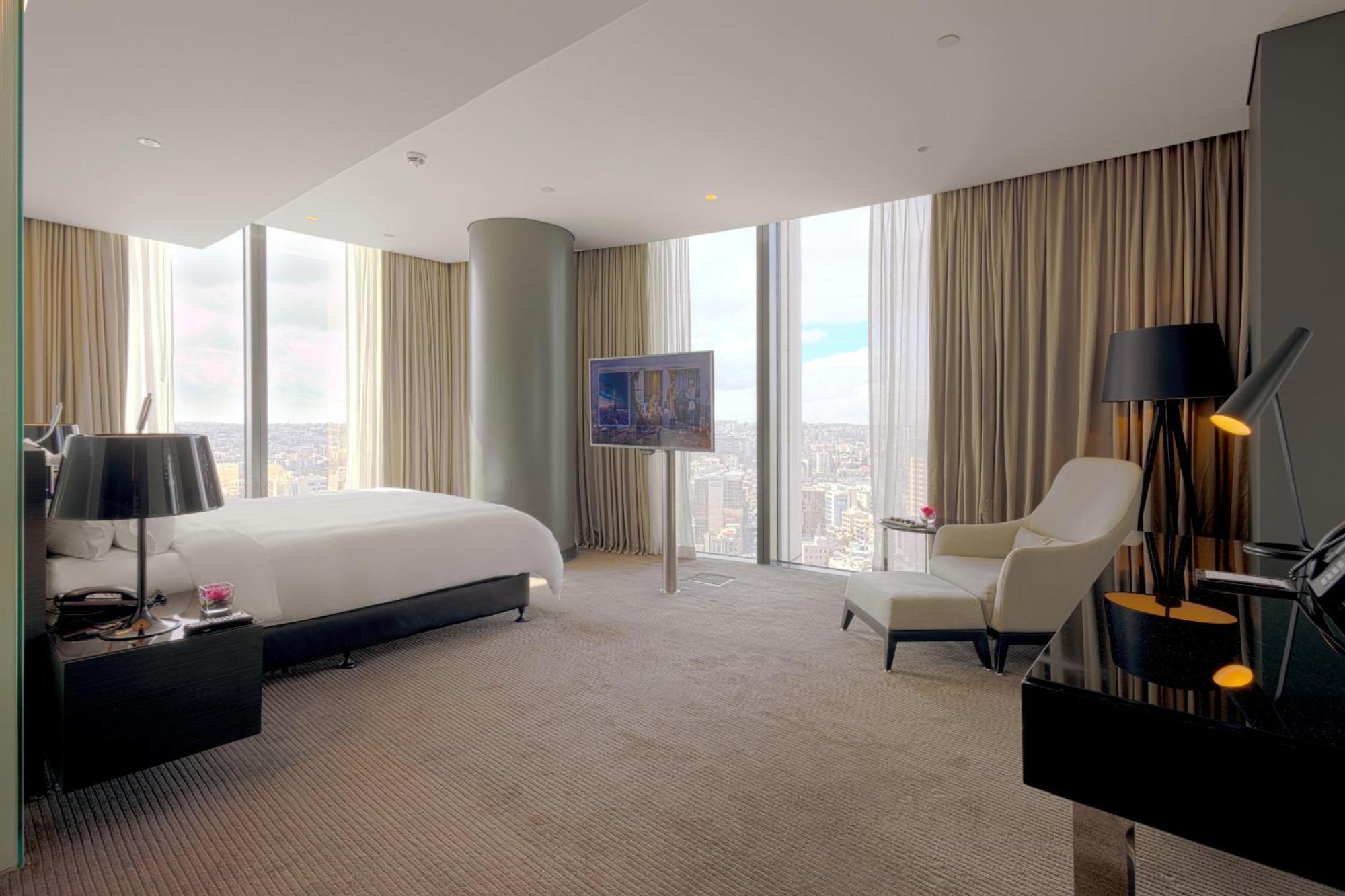 Habitación Esquinera Grande con vistas a la ciudad - Cama extragrande