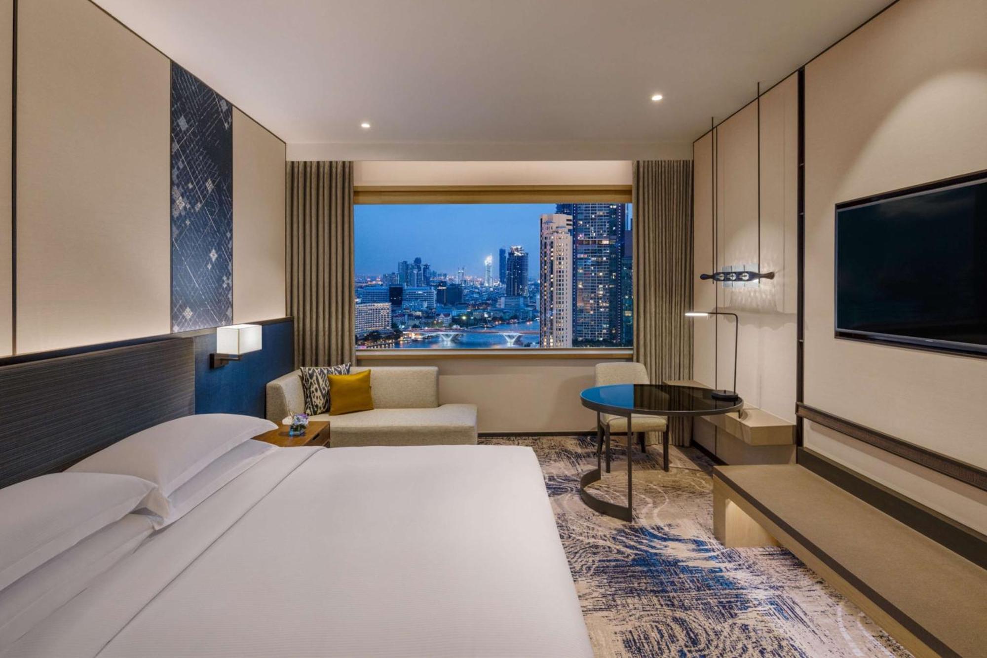 Habitación Executive con acceso al salón y cama extragrande