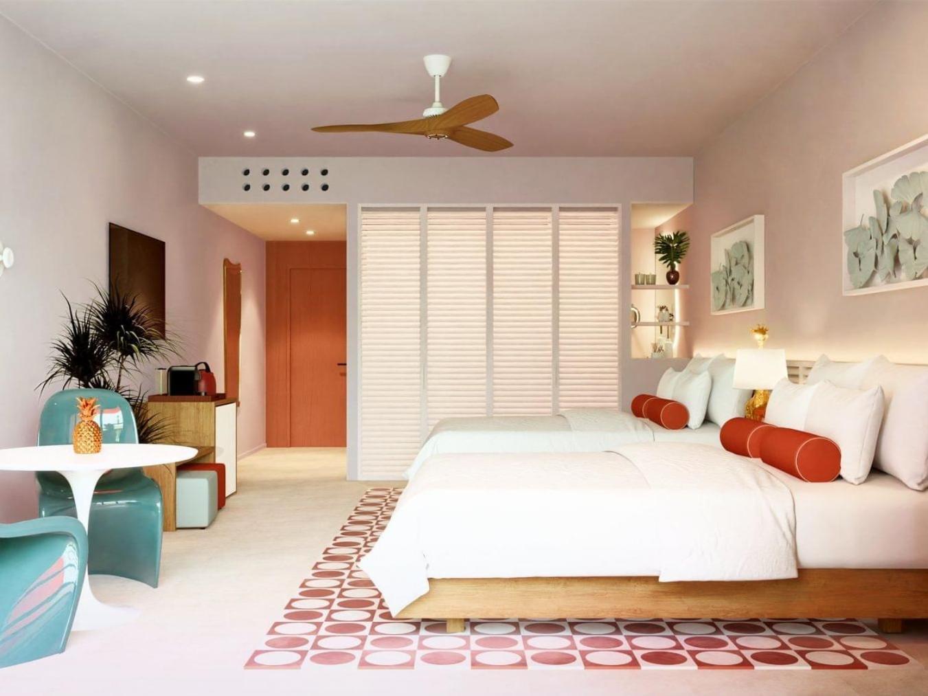 Alojamiento Premium con 2 camas dobles y vistas a la piscina