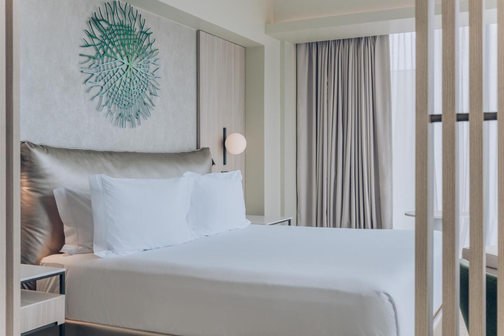 Habitación con cama extragrande y vistas a la ciudad - Adaptada para personas de movilidad reducida