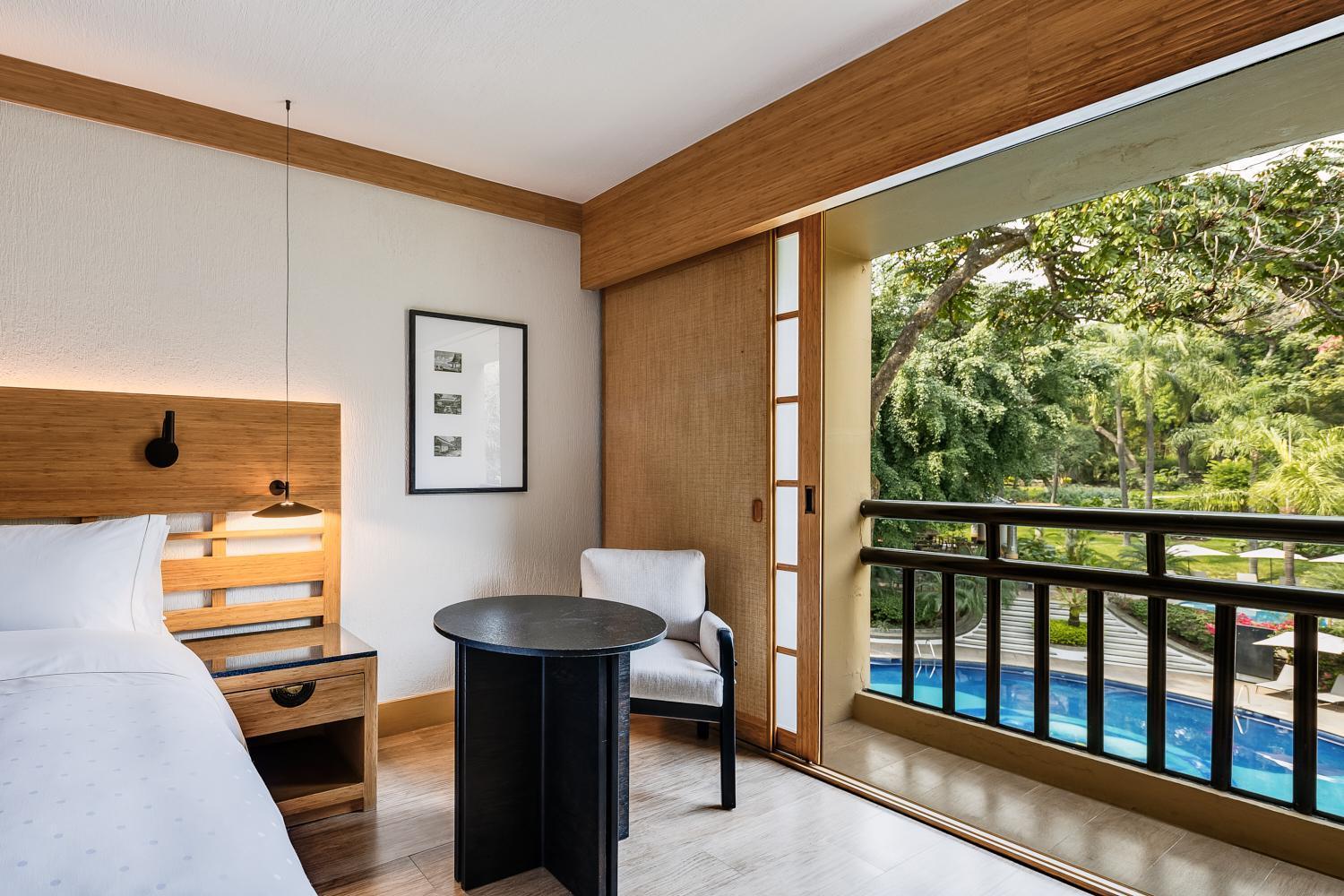Habitación Deluxe con vistas a la piscina - 1 cama extragrande