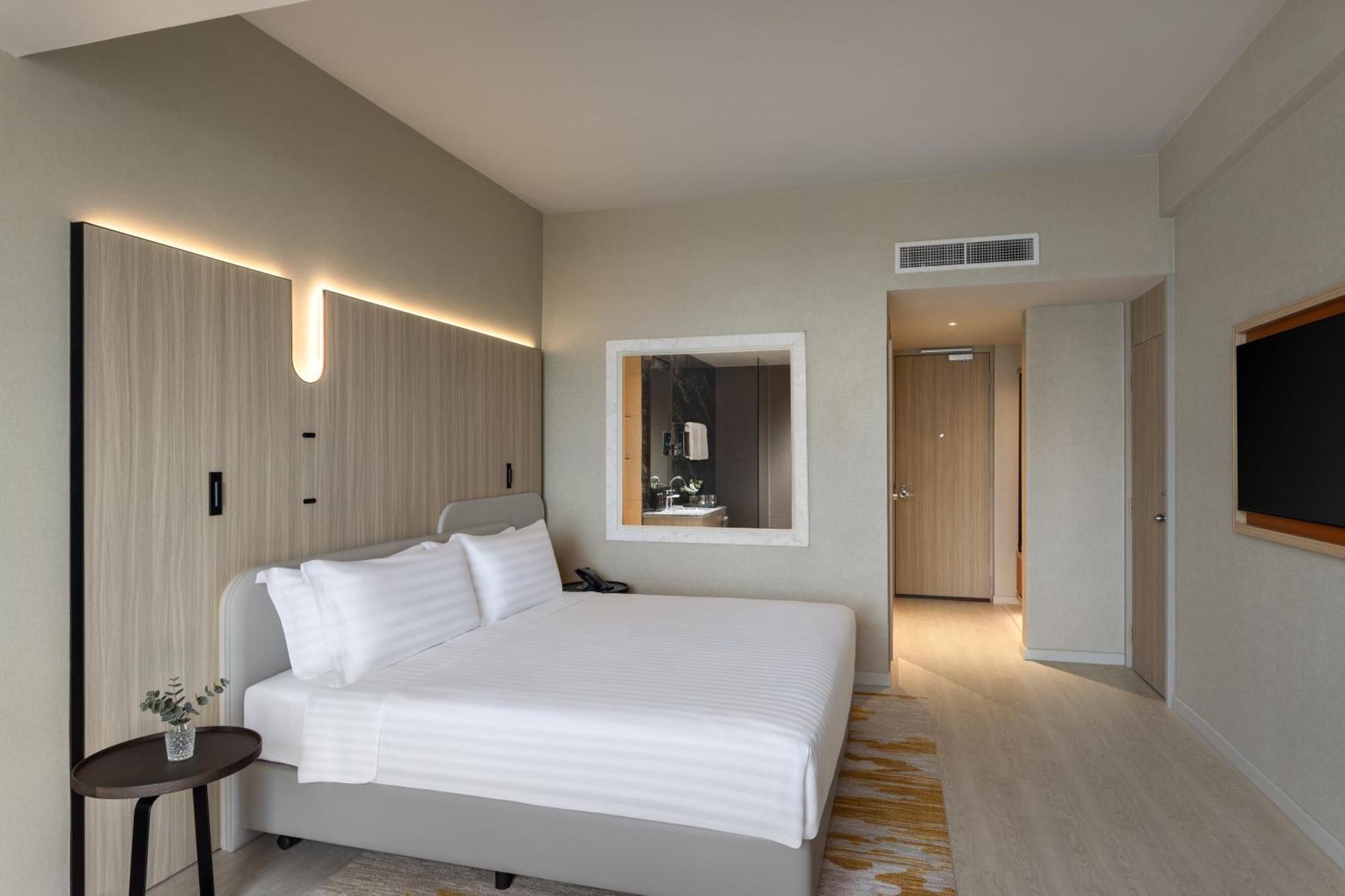 Habitación Executive Club con vistas al perfil urbano - Cama extragrande
