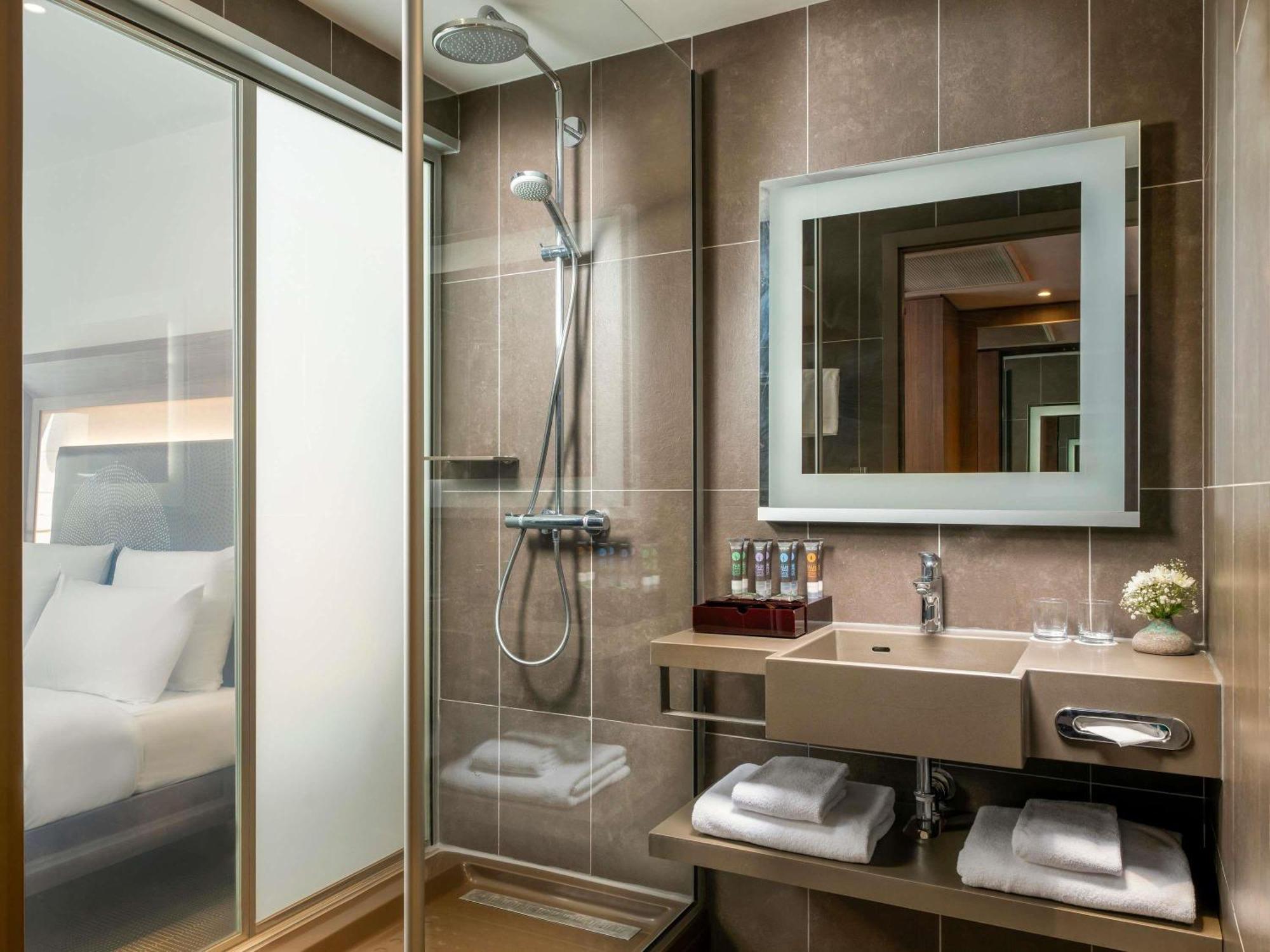 Habitación Executive con cama grande, sofá cama y vistas al mar