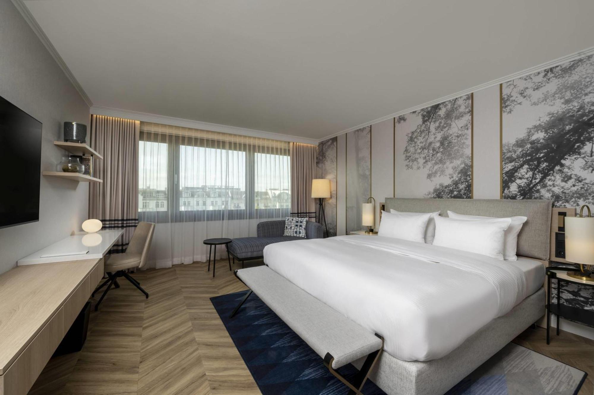 Habitación Executive con acceso al salón y cama extragrande