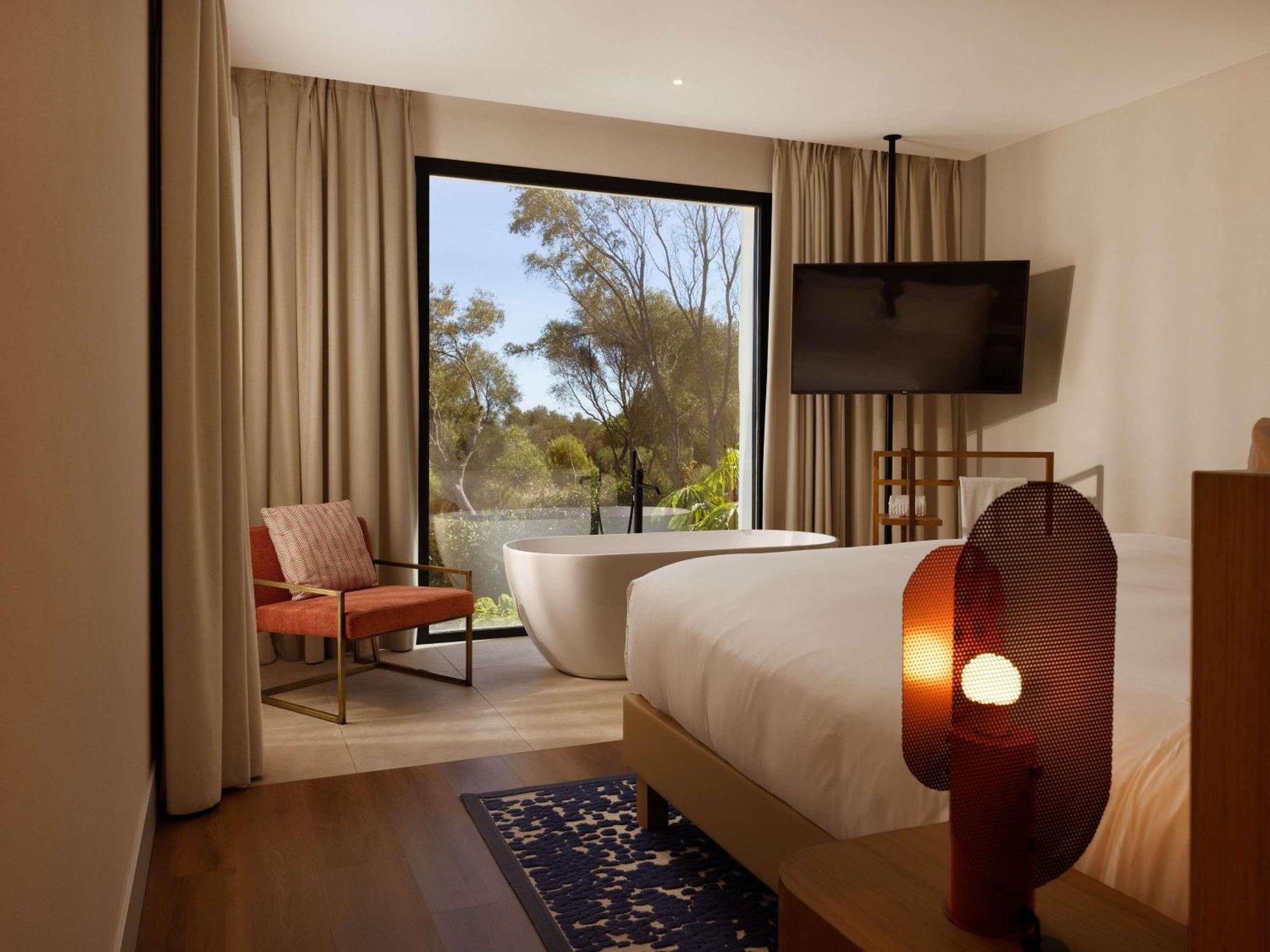 SO LOFTY con zona de estar y terraza - 1 cama extragrande