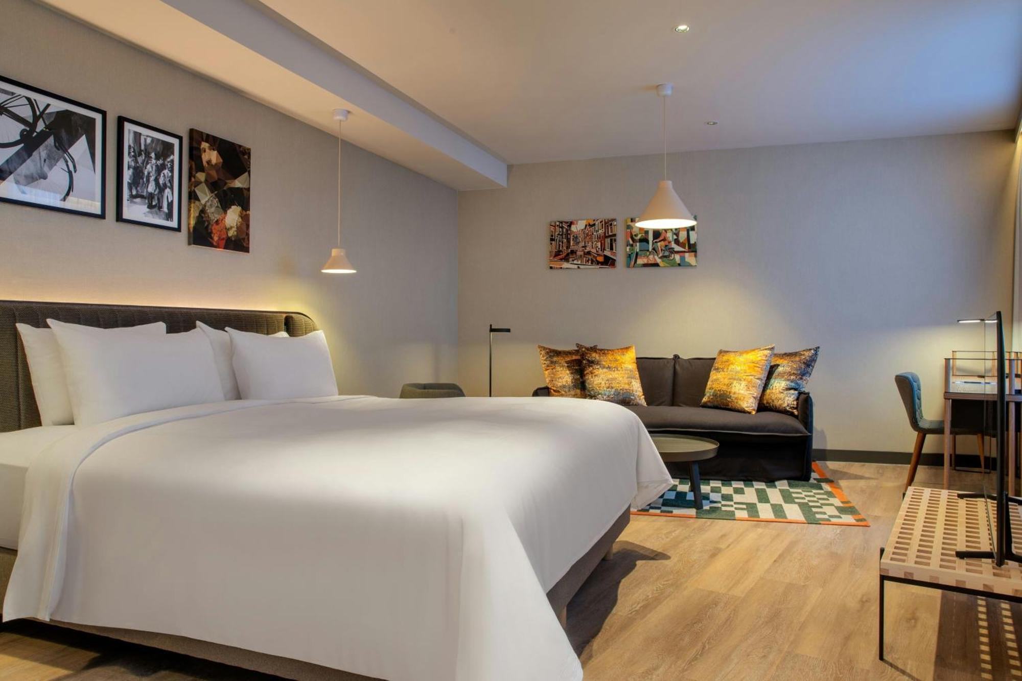 Habitación Doble Deluxe con cama extragrande y vistas a la ciudad