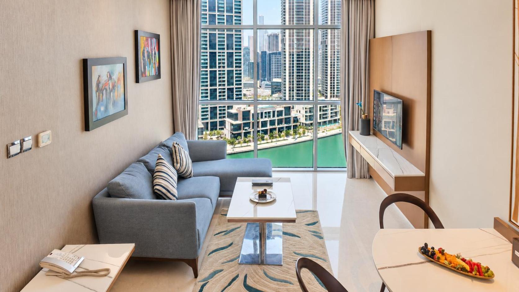 Suite de 1 dormitorio con vistas al canal de Dubái y acceso gratuito a la playa privada del hotel en Palm Jumeirah
