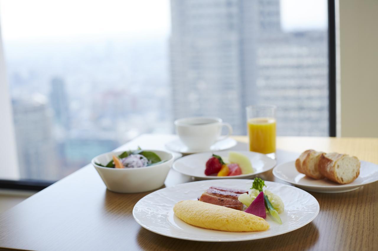 Suite Premier Grand con cama extragrande y acceso al club lounge - Planta Club - No fumadores